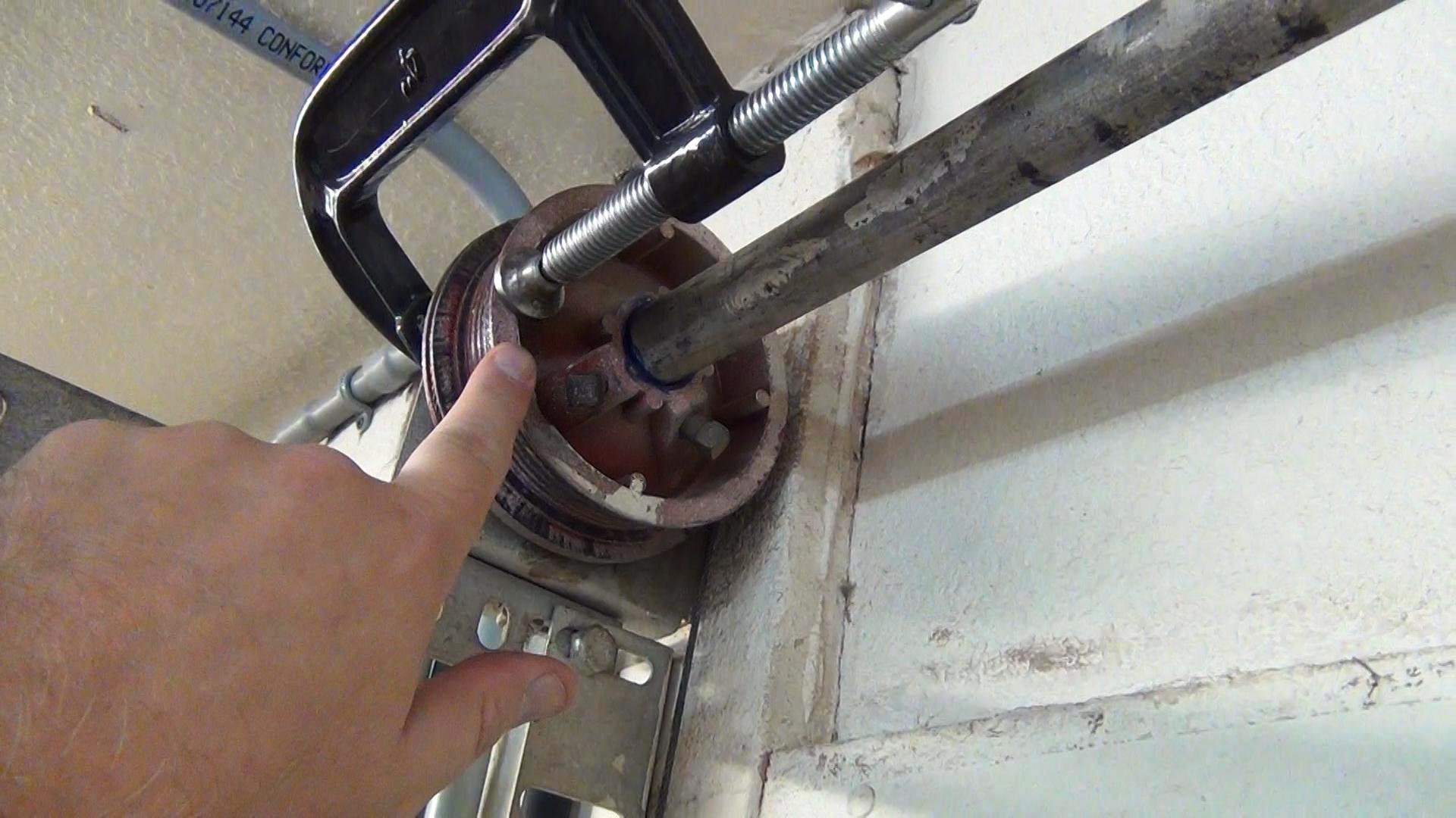 Garage Door Torsion Spring Replacement - SOS Garage Door Naples